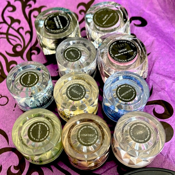 Younique Other - A bunch of Younique makeup and Younique bag .